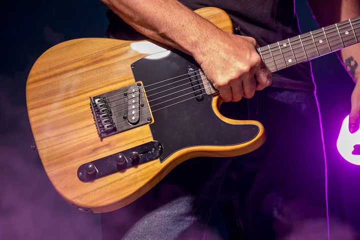 why pawn guitar with us